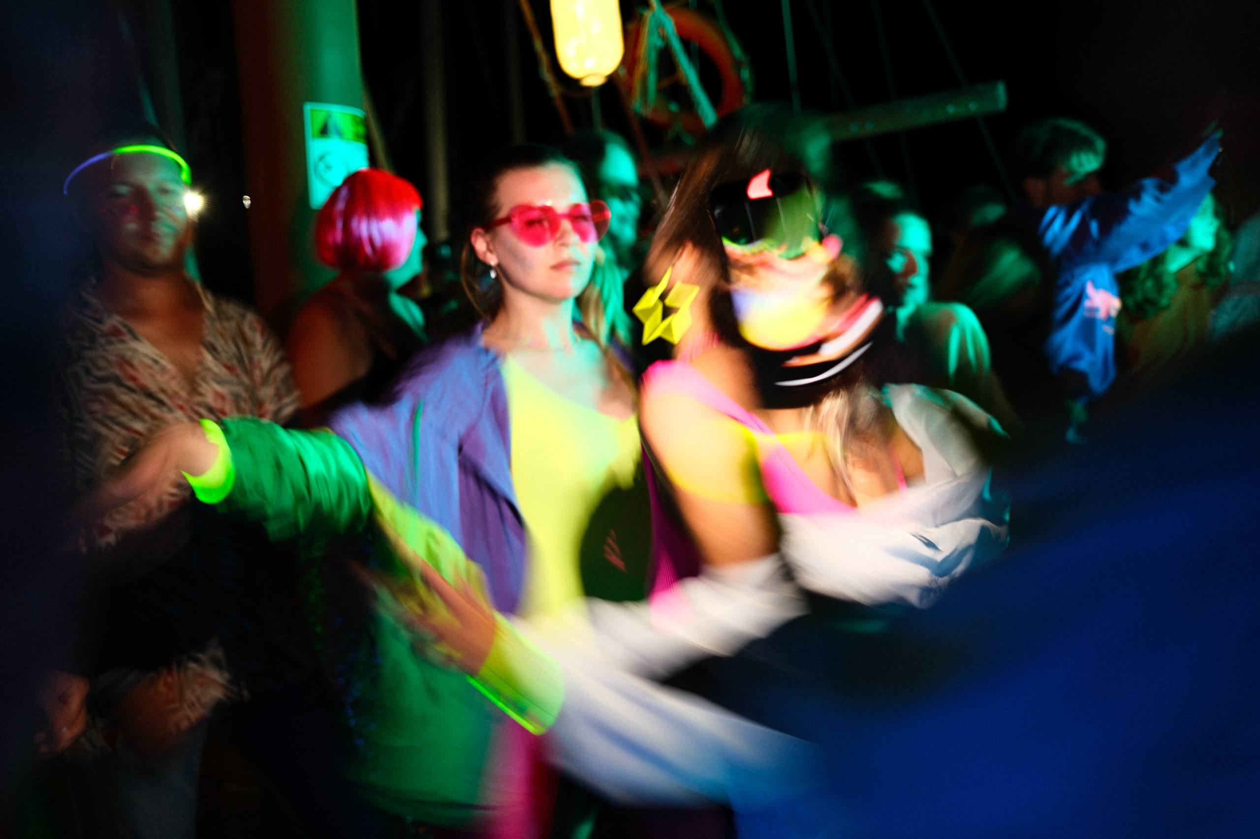 Neon party night on yacht deck